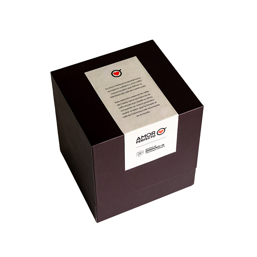 Caja de regalo premium de café de especialidad Amor Perfecto. Empaque elegante con selección especial de cafés de Caldas, Colombia, resaltando la tradición cafetera y el sabor del café colombiano.